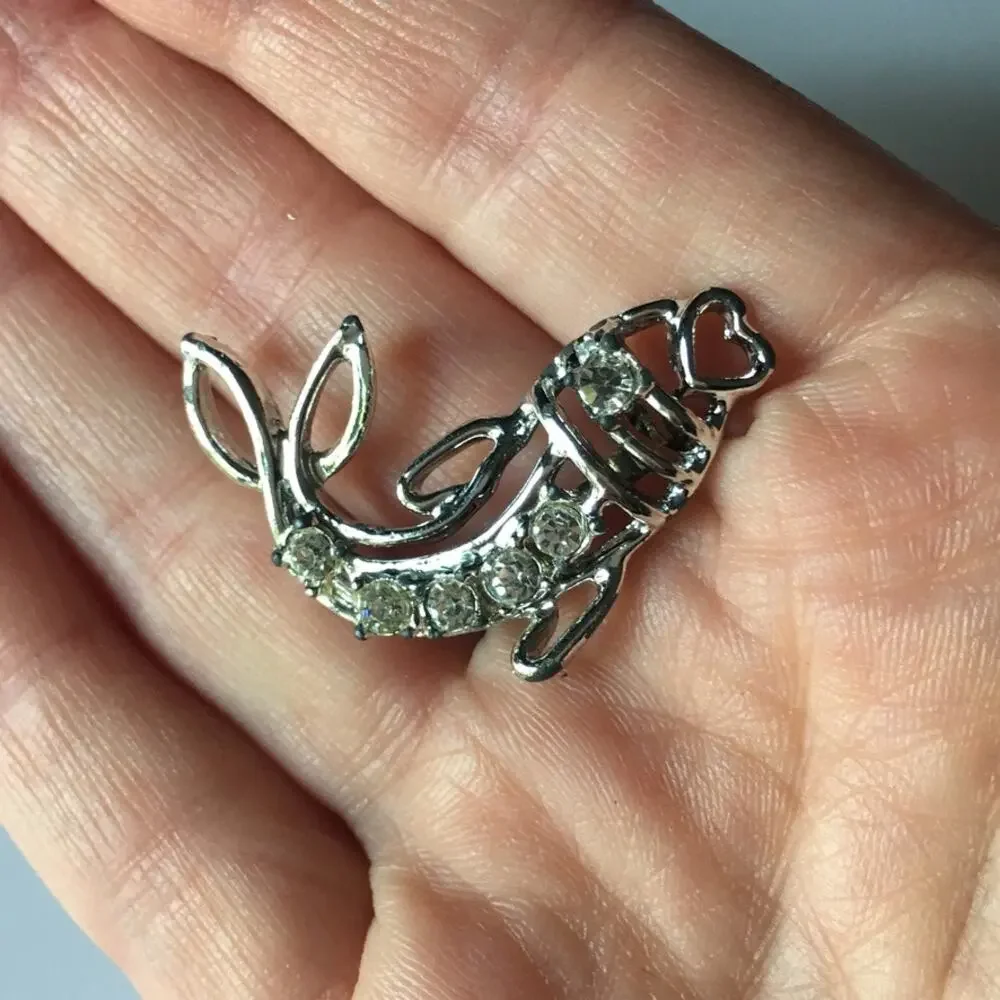 Silver tone rhinestone openwork fish brooch, pin